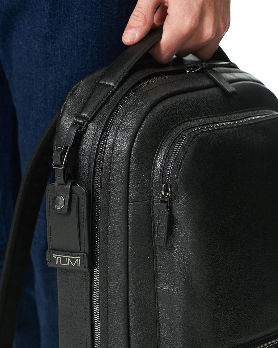 Glidelås i skinn sekk